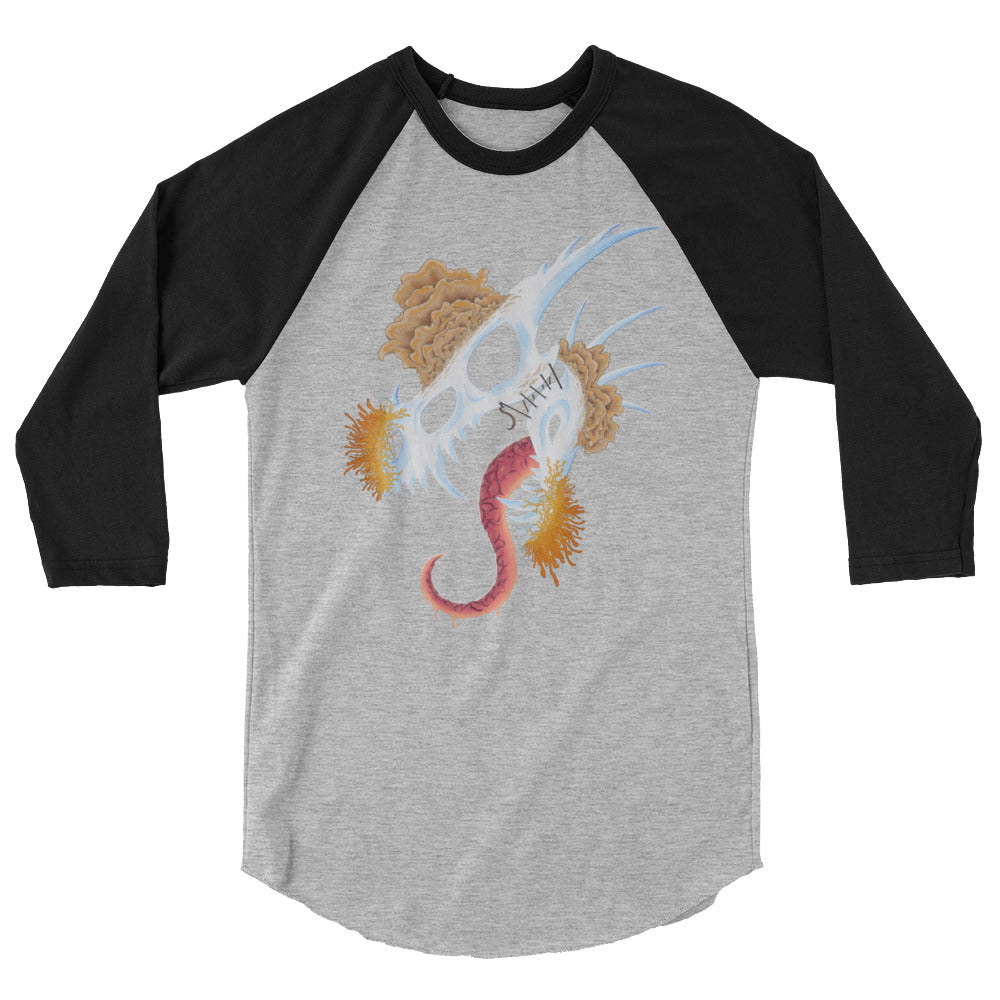 dragon skull with three different types of mushrooms growing from it on a heather grey raglan shirt with black sleeves