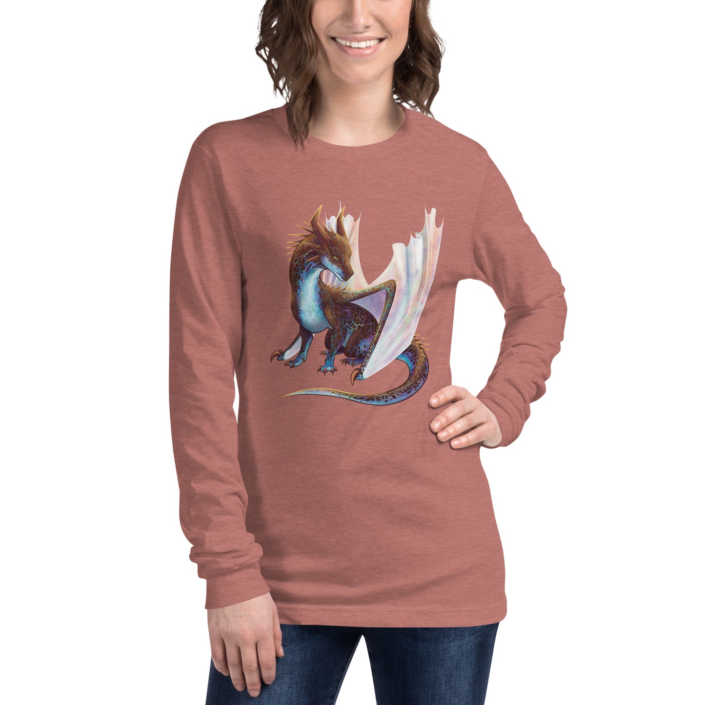 Unisex, heather mauve in color adult long sleeve shirt featuring a sitting, side profile of a dragon that has the features of a boulder opal with hues of blue, green, purple, and pink on the underbelly and cracks of the rough, brown hue, rock scales. The wings are tucked back and are of an iridescent shimmery hue