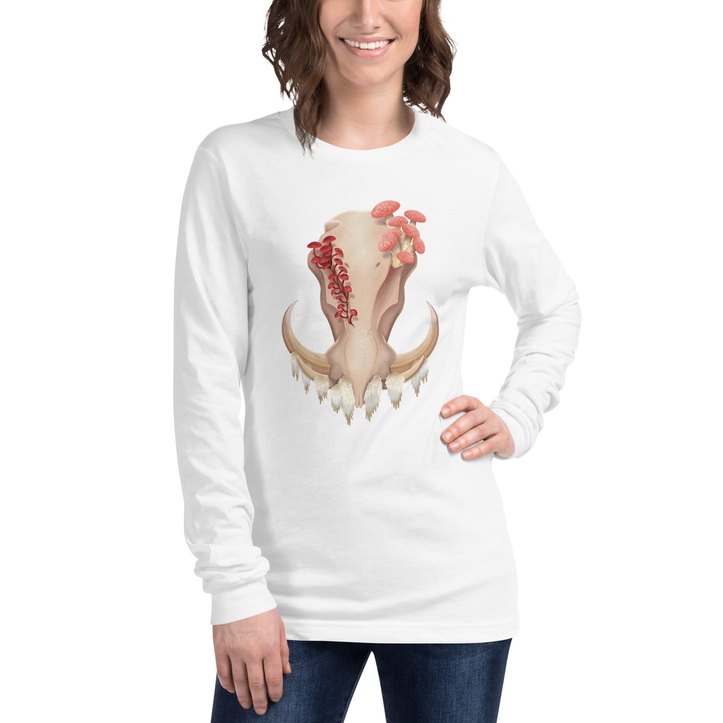 An adult wearing a white, unisex, long sleeve shirt featuring a front facing warthog skull with 3 different kinds of fungi growing out of it