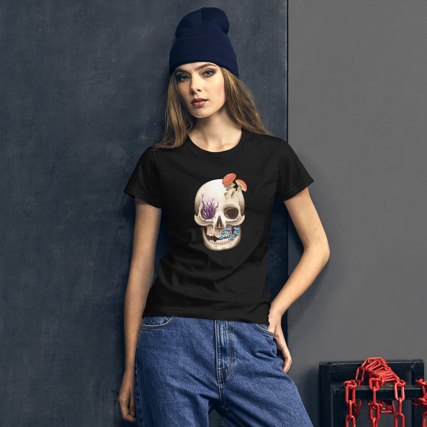 A black woman's fit t shirt featuring a human skull with various kinds of fungi growing out of it